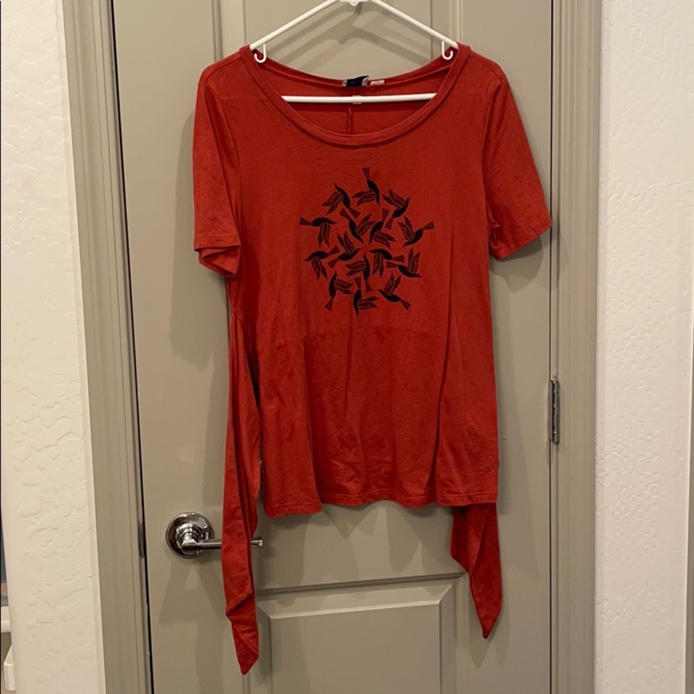 Women’s top with bird design